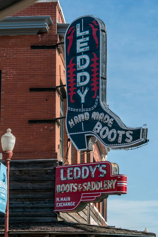 A large boot-shaped neon sign for leddy hand made boots.