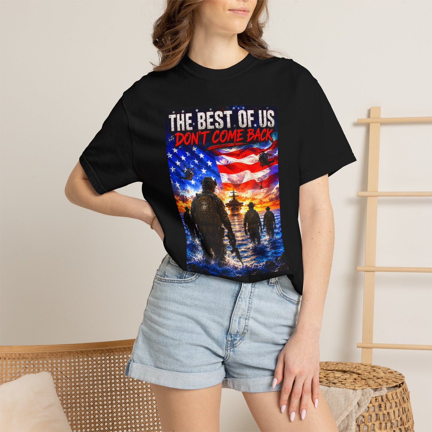 Vintage Garment-Dyed T-Shirt #17 featuring a graphic of soldiers against an American flag backdrop, worn with denim shorts.