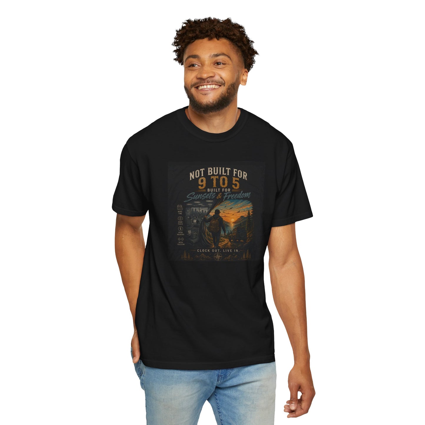 Black "Not Built for 9 to 5" T-shirt featuring a graphic design, worn by a smiling man in a casual setting.