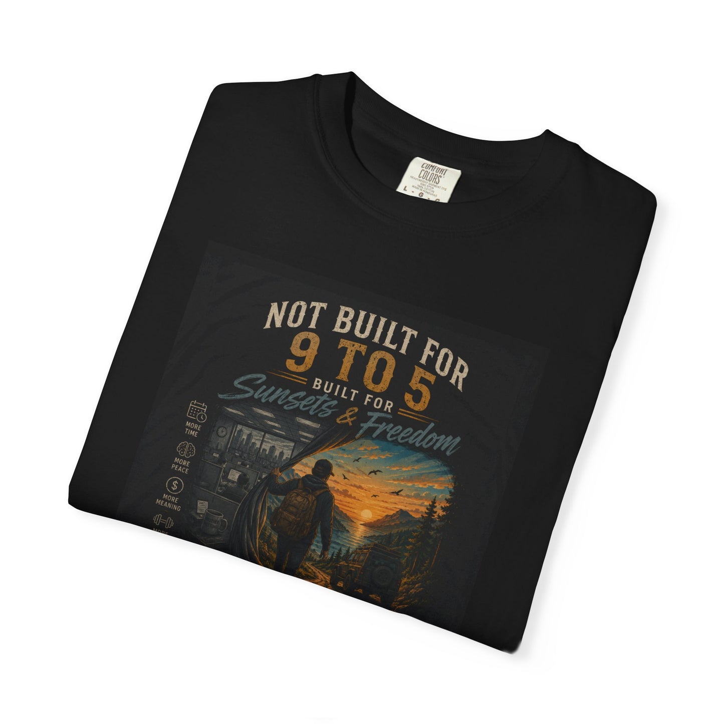 Black "Not Built for 9 to 5" garment-dyed casual tee featuring a graphic of a person walking towards a sunset.