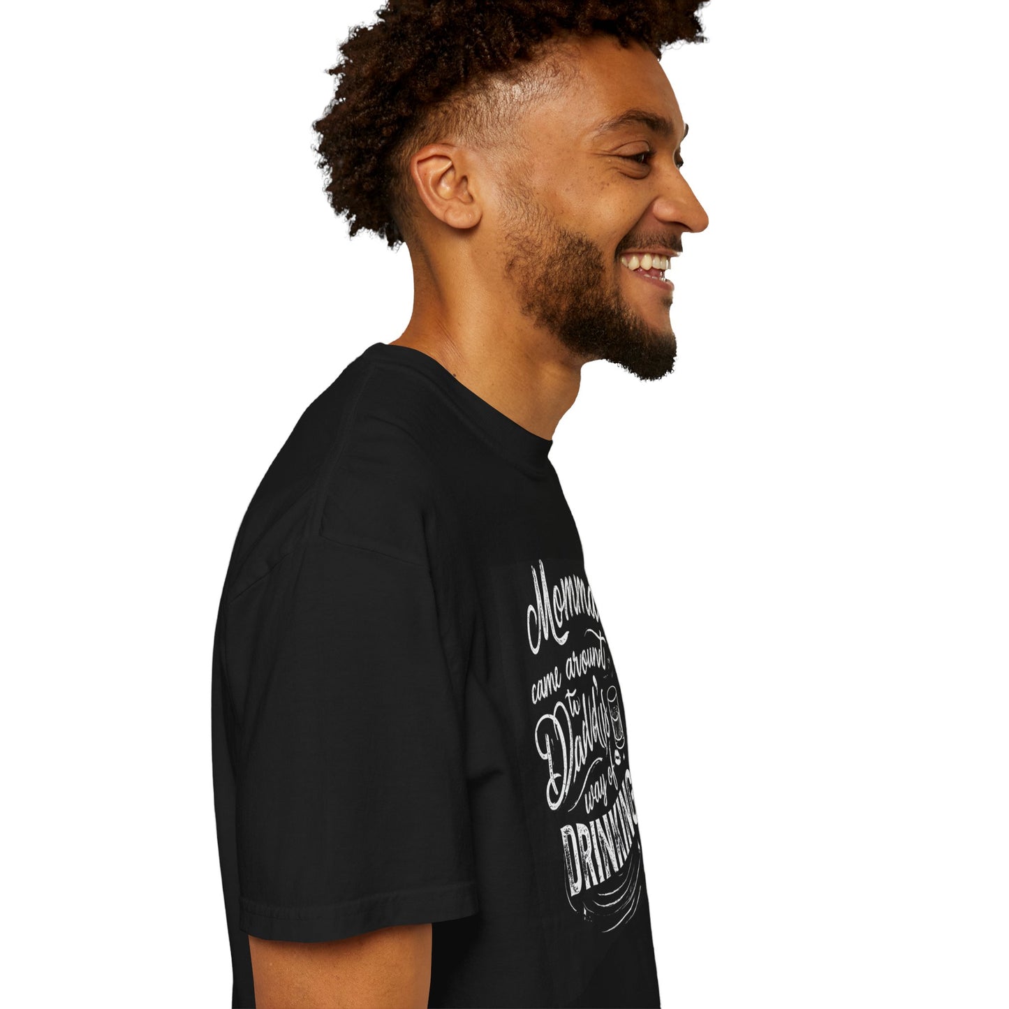 Unisex Drinking T-shirt in black featuring a playful graphic design on the front, modeled by a smiling man.