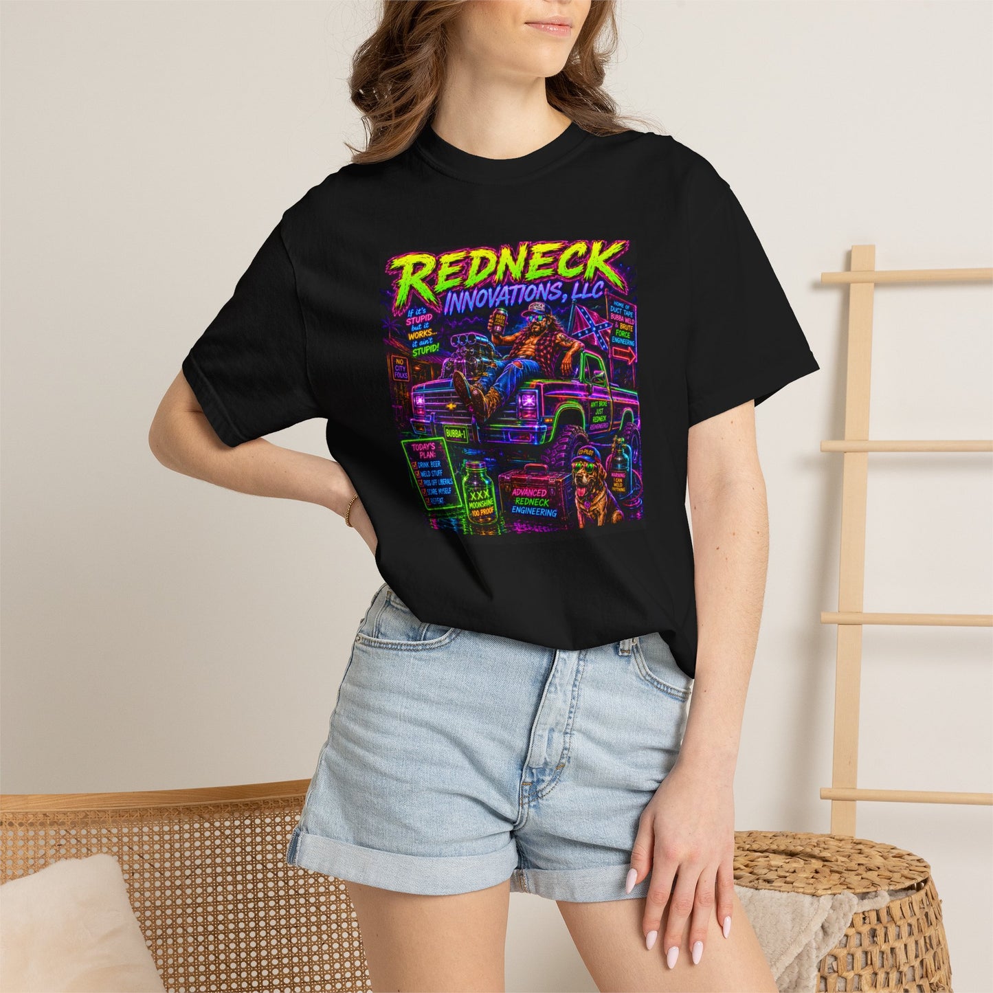 Vintage Garment-Dyed T-Shirt #12 features a colorful graphic design on a black shirt, paired with denim shorts.