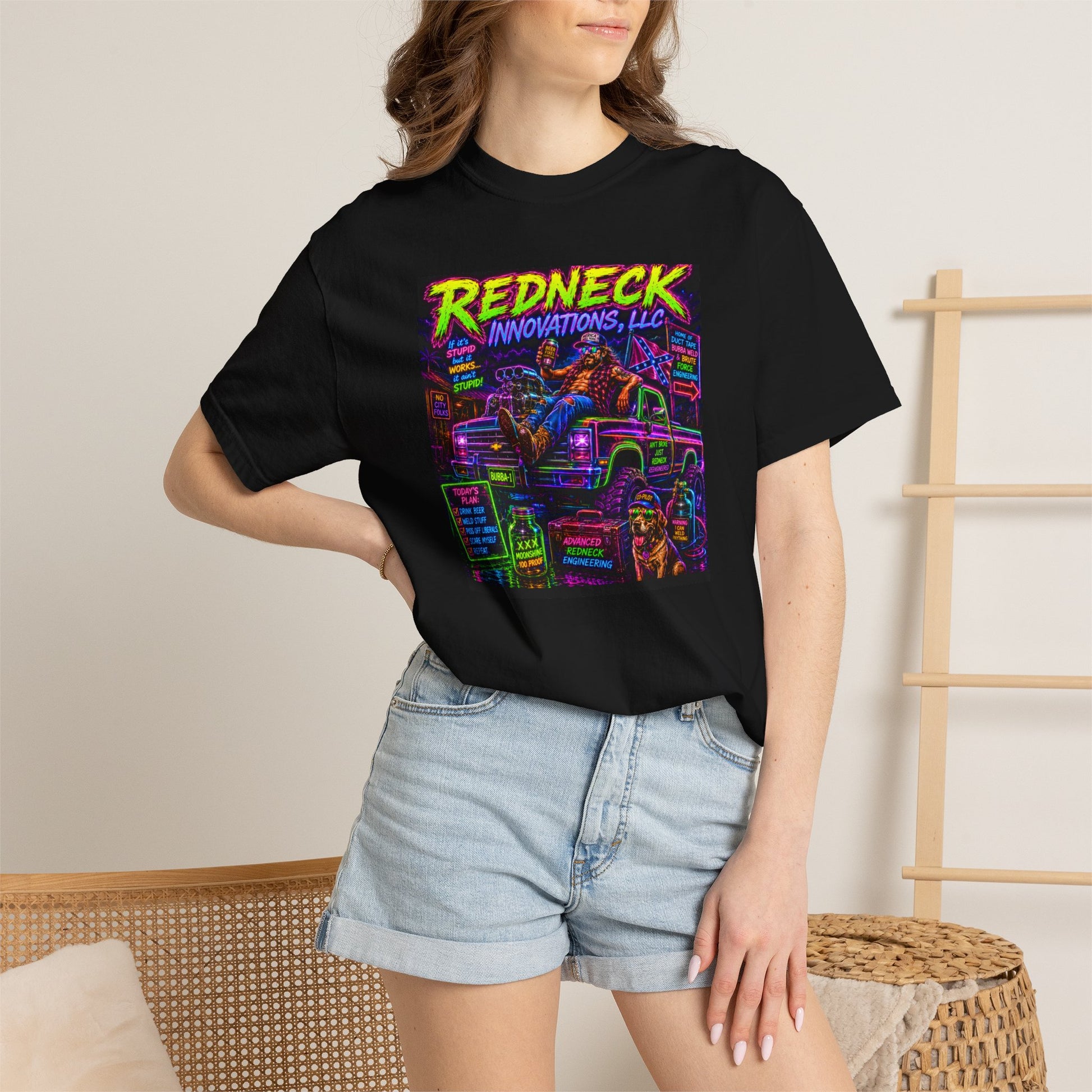 Vintage Garment-Dyed T-Shirt #12 features a colorful graphic design on a black shirt, paired with denim shorts.