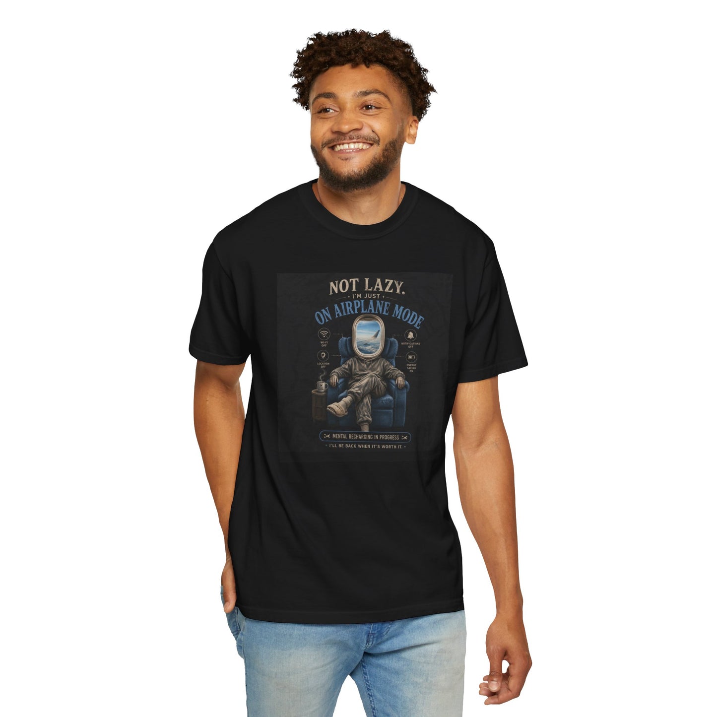 Black t-shirt featuring an astronaut graphic with the text "Not Lazy, Just on Airplane Mode," ideal for travel enthusiasts.