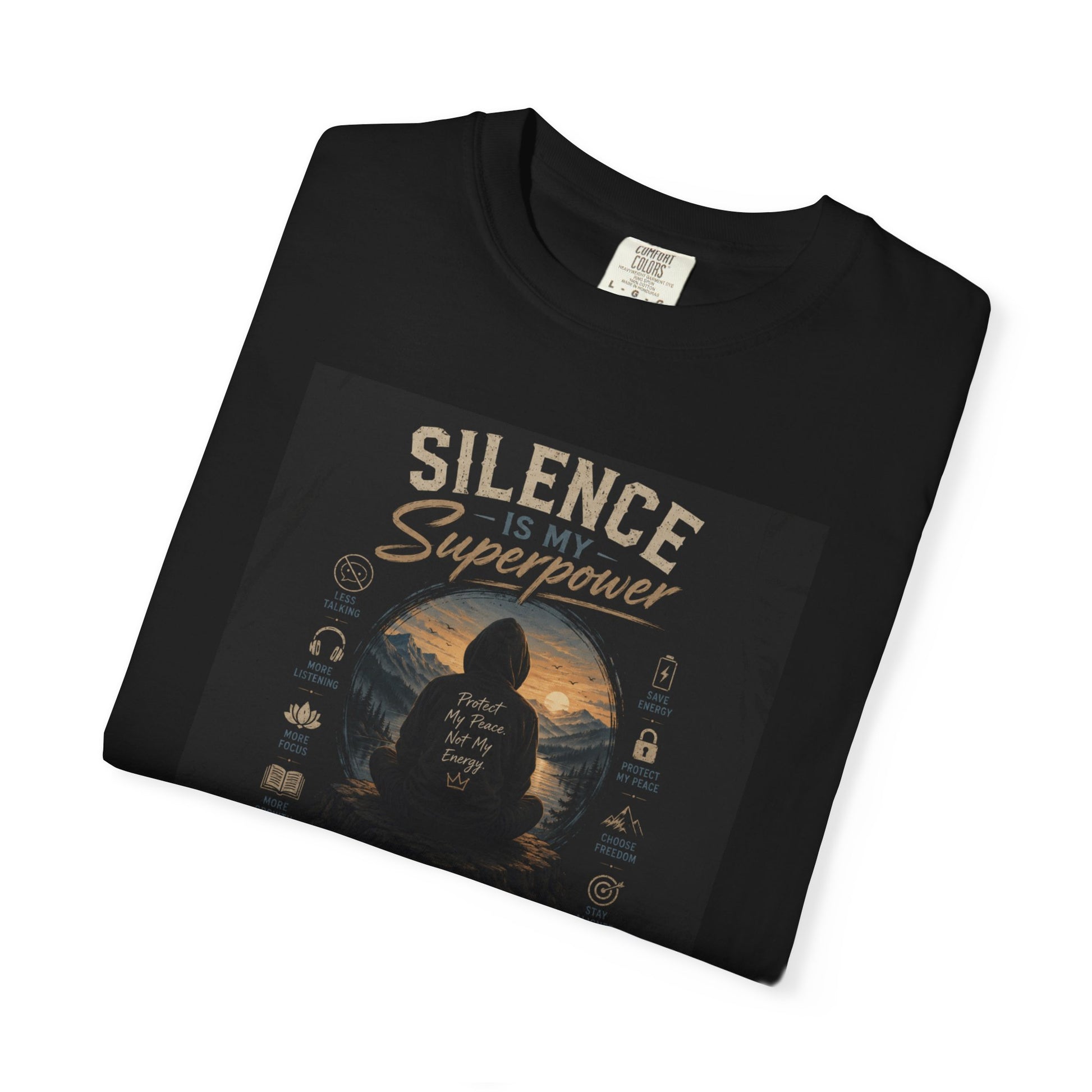 Black t-shirt featuring the text "Silence Is My Superpower" with a graphic of a hooded figure and nature elements.