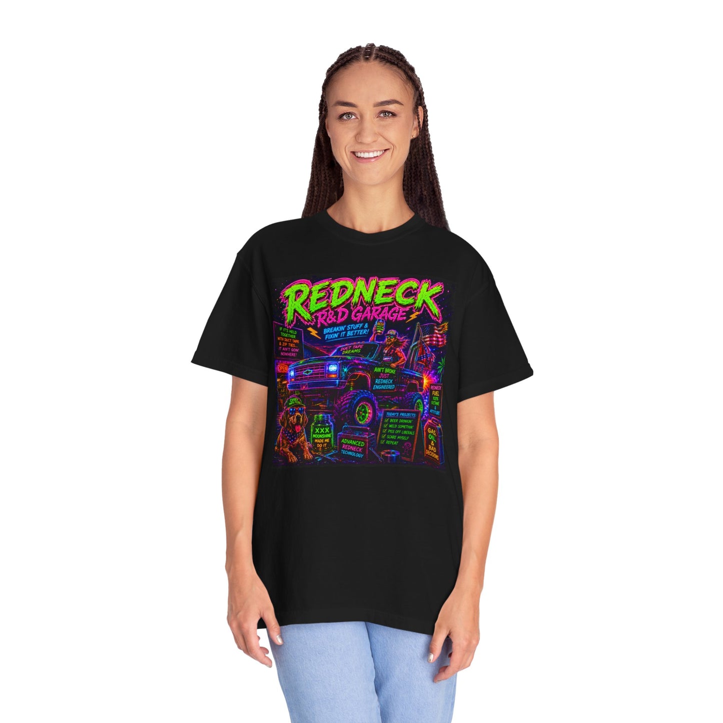 Vintage Garment-Dyed T-Shirt #13 in black featuring colorful "Redneck Garage" graphic on the front, model wearing it.