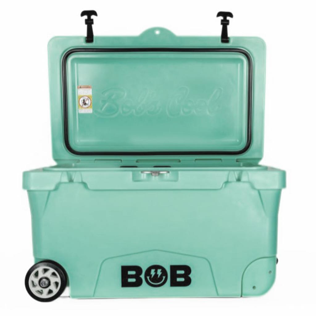 75QT "BFF" Hard Cooler in teal with a wheeled base and an open lid, featuring a logo on the front. Ideal for outdoor use.