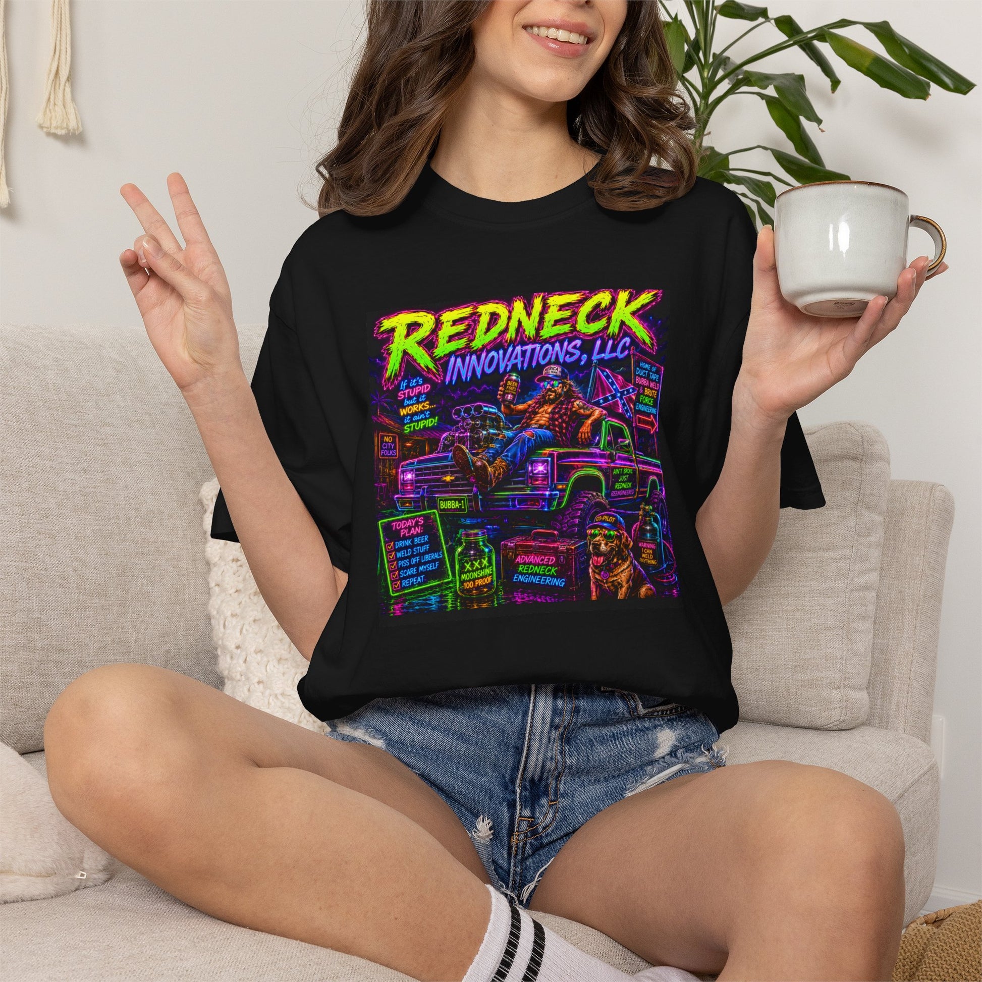 Vintage Garment-Dyed T-Shirt #12 features a colorful graphic design with "Redneck Innovations, LLC" text on a black shirt.