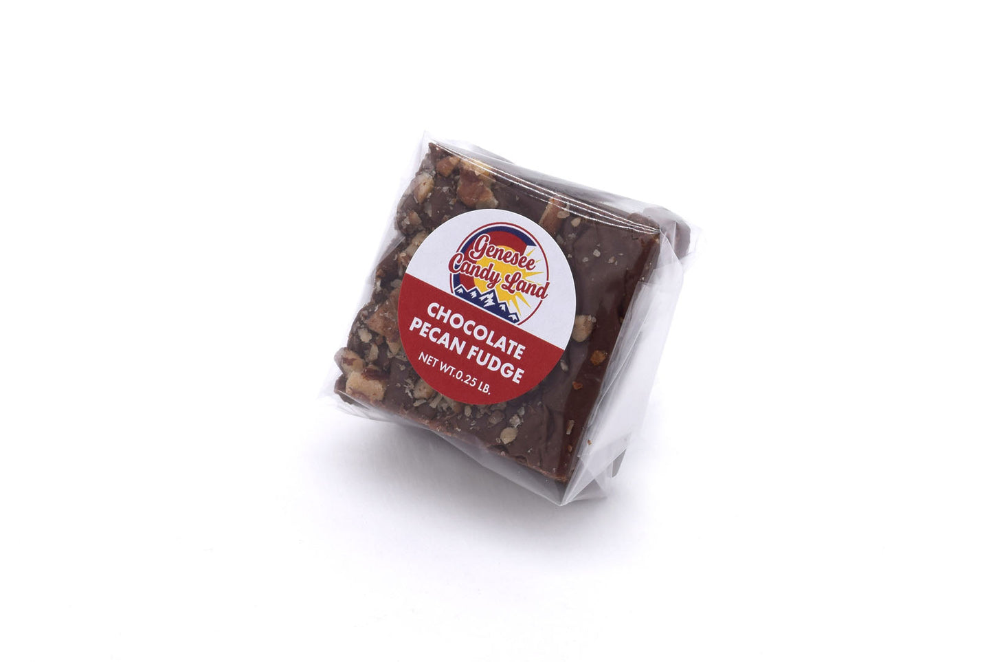 Chocolate Pecan Fudge wrapped in clear plastic, featuring a colorful label with product name and brand logo.
