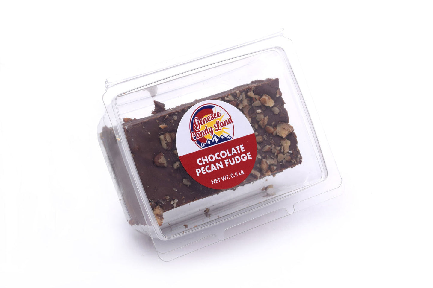 Chocolate Pecan Fudge in clear packaging, topped with chopped pecans, featuring a colorful label with product name.